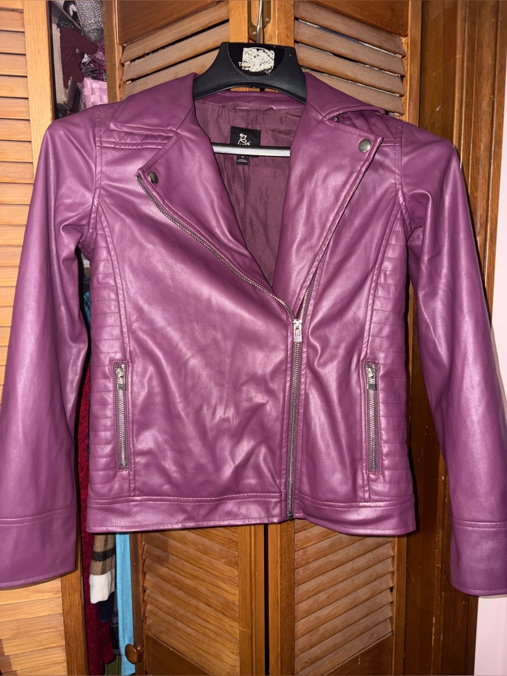 Purple leather style jacket.